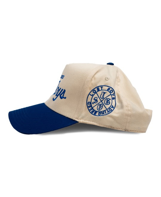 “THE CLASSIC” SNAPBACK IN CREAM/ROYAL